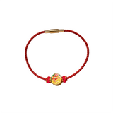 Red bracelet with a gold clasp and a decorative red charm handmade jewelry | Heartfullnet
