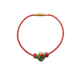 Red braided coil bracelet with a decorative green and red heart-shaped charm handmade jewelry | Heartfullnet