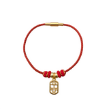 Red wire coil bracelet with a golden charm handmade jewelry | Heartfullnet